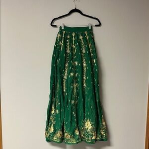 Voluminous Green Skirt with Gold Embroidery and Sequins